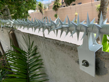 Load image into Gallery viewer, single row rotating spikes, Star rotating spikes, wall spikes, most effective anti-climb wall spikes, security spike, protect your home, secure your home business, security south africa, Spike-it security, Rola spikes, Star Spikes, rotating security spikes, wall spikes, vibracrete spikes, brick wall spikes,