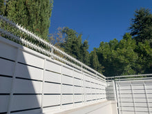 Load image into Gallery viewer, Double row rotating spikes, Star rotating spikes, wall spikes, most effective anti-climb wall spikes, security spike, protect your home, secure your home business, security south africa, Spike-it security, Rola spikes, Star Spikes, rotating security spikes